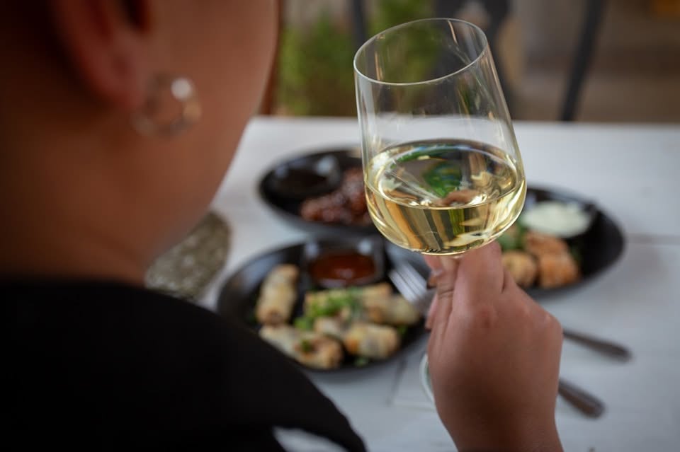 A glass of wine with a relaxed meal at Café Crust